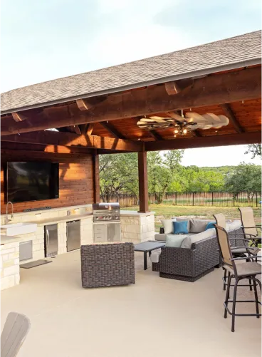 outdoor patio with tv and ceiling fan